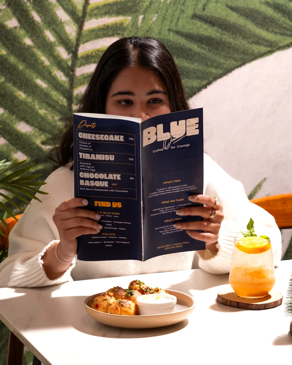 Guest reading the menu